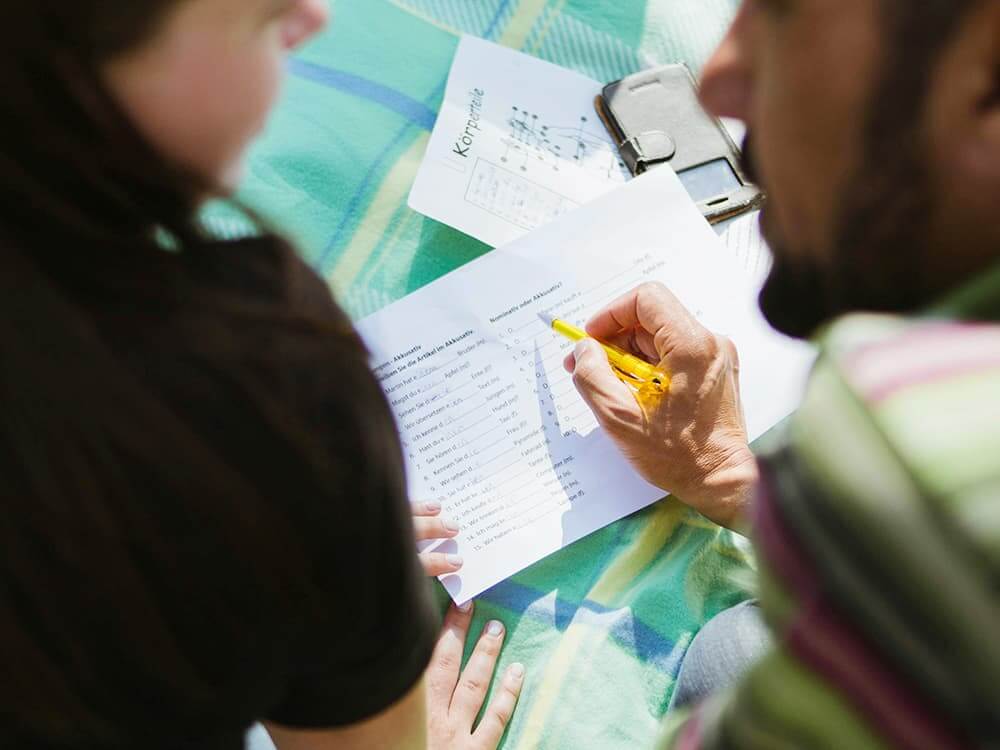 Man teaching daughter